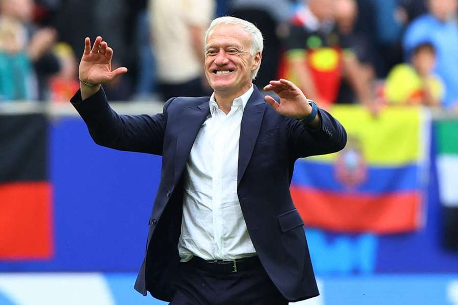 Didier Deschamps celebrates after France saw off Belgium