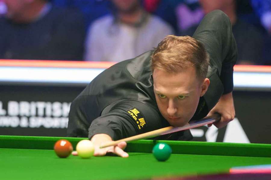 Judd Trump is one victory away from having the chance to defend his title in this year's final