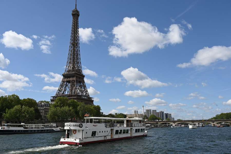 A Peniche boat sails past the Eiffel Tower during testing