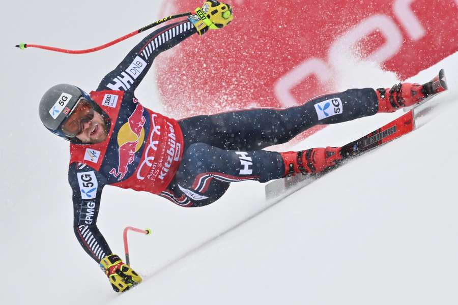 Kilde races down the slopes during the men's downhill competition