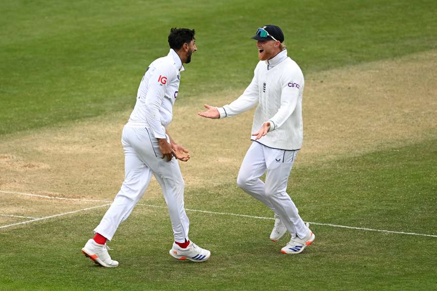 England's Shoaib Bashir celebrates with Ben Stokes