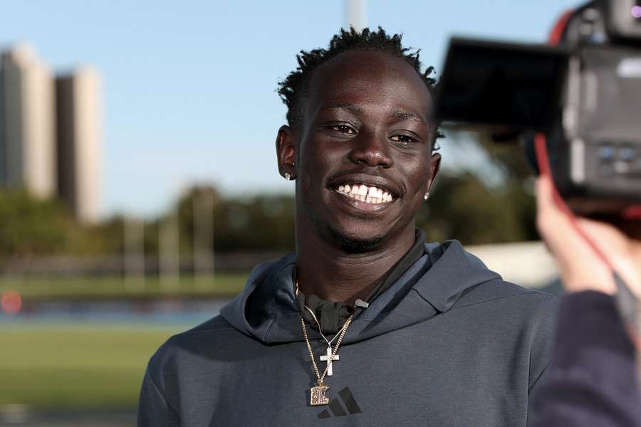 Gout Gout poses for photographs at Lakeside Stadium in Melbourne on Thursday.