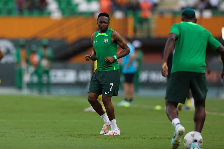 Musa warms up ahead of a Nigeria match