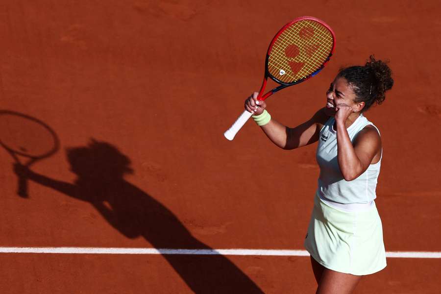 Jasmine Paolini celebrates after making the French Open final