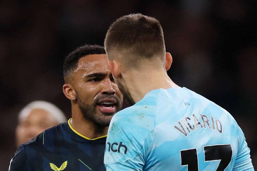 Tottenham Hotspur's Guglielmo Vicario and Newcastle United's Callum Wilson clash after the match