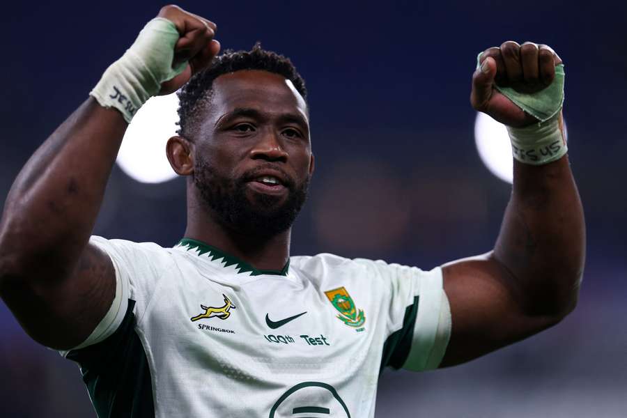 A triumphant Springboks captain Siya Kolisi acknowledges supporters following their win over France. A triumphant Springboks captain Siya Kolisi acknowledges supporters following their win over France.