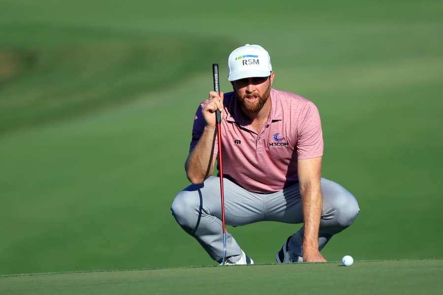 Chris Kirk of the United States lines up a putt