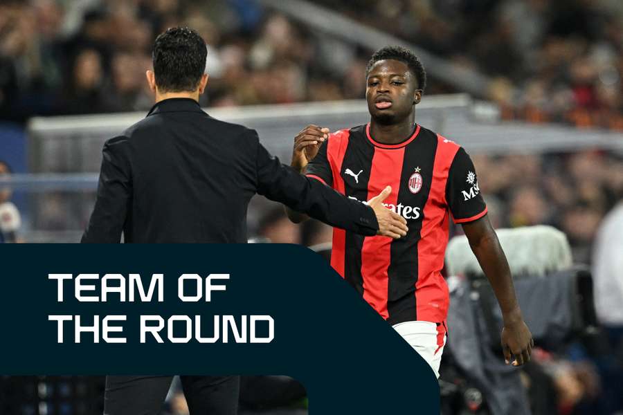 Cisse (R) shakes hands with AC Milan boss Ruben Amorim Cisse (R) shakes hands with AC Milan boss Ruben Amorim