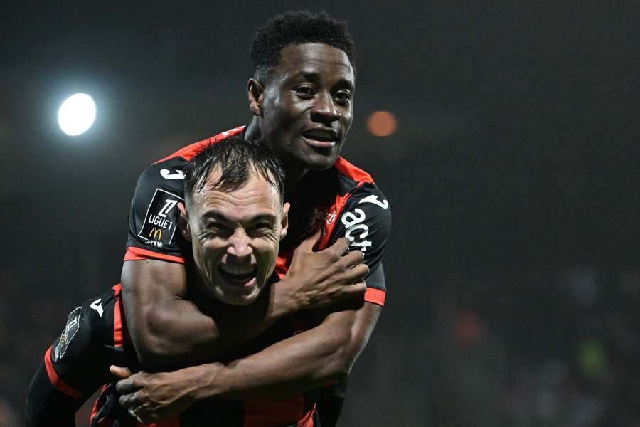 Pablo Pagis (left) celebrates Lorient's winning goal Pablo Pagis (left) celebrates Lorient's winning goal