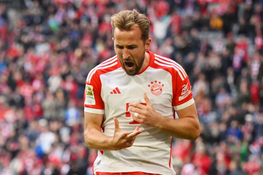 Harry Kane celebrates after scoring the opening goal against Darmstadt