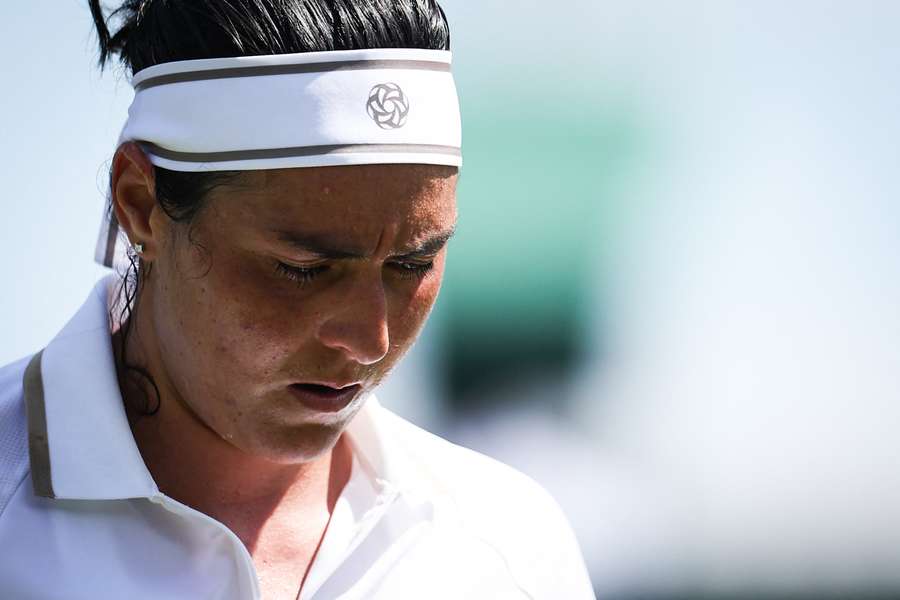 Tunisia's Ons Jabeur reacts as she plays against Bulgaria's Viktoriya Tomova