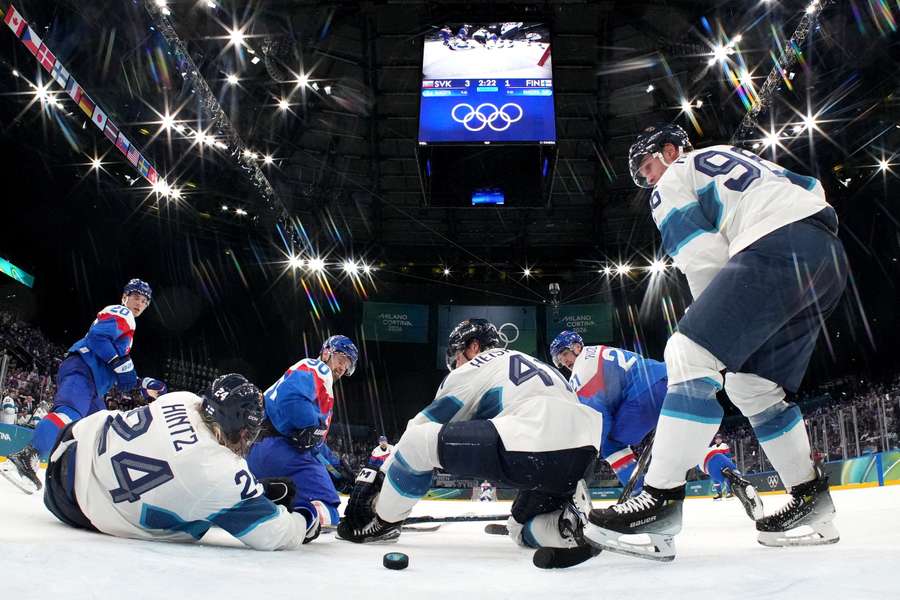 Adam Ruzicka of Slovakia scores their fourth goal against Finland in the Olympics opener