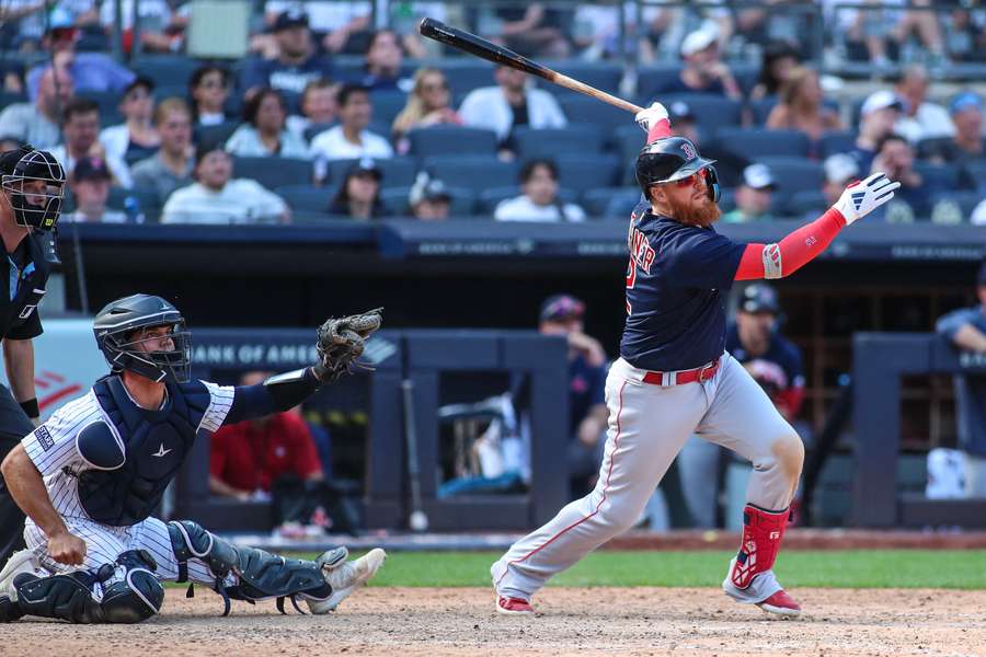 Turner hits an RBI double in the ninth inning against the New York Yankees