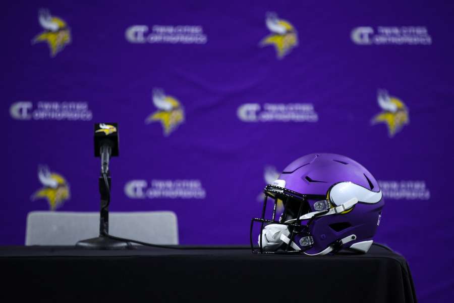 Minnesota Vikings helmet lies on top of the podium
