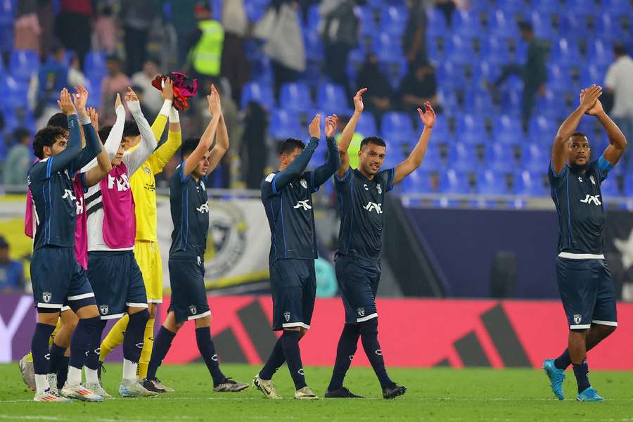 Los jugadores del Pachuca celebran la victoria