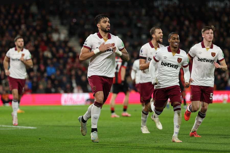 West Ham's Brazilian midfielder Lucas Paqueta (second left) celebrates after scoring the opening goal against Bournemouth