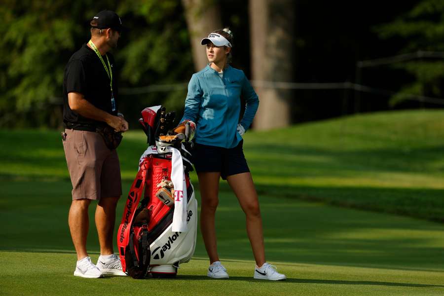 Nelly Korda talks with her caddie Jason McDede during a practice round prior to the KPMG Women's PGA Championship at Baltusrol Golf Club