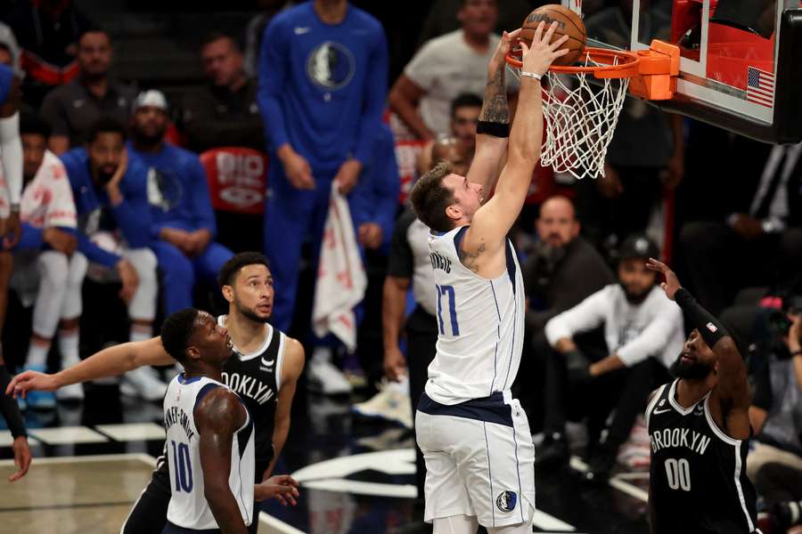 NBA roundup: Luka Doncic gets triple-double in Mavs' OT win ...