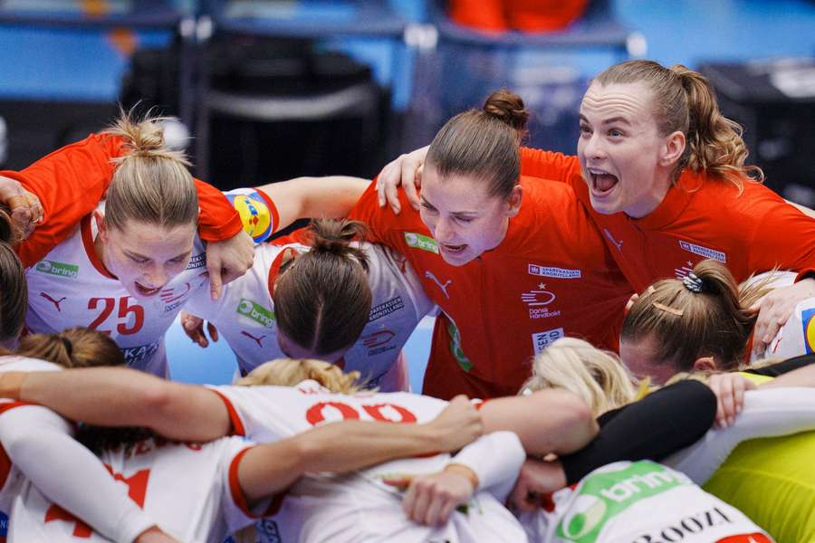 Denmark celebrate their second win at the World Championships