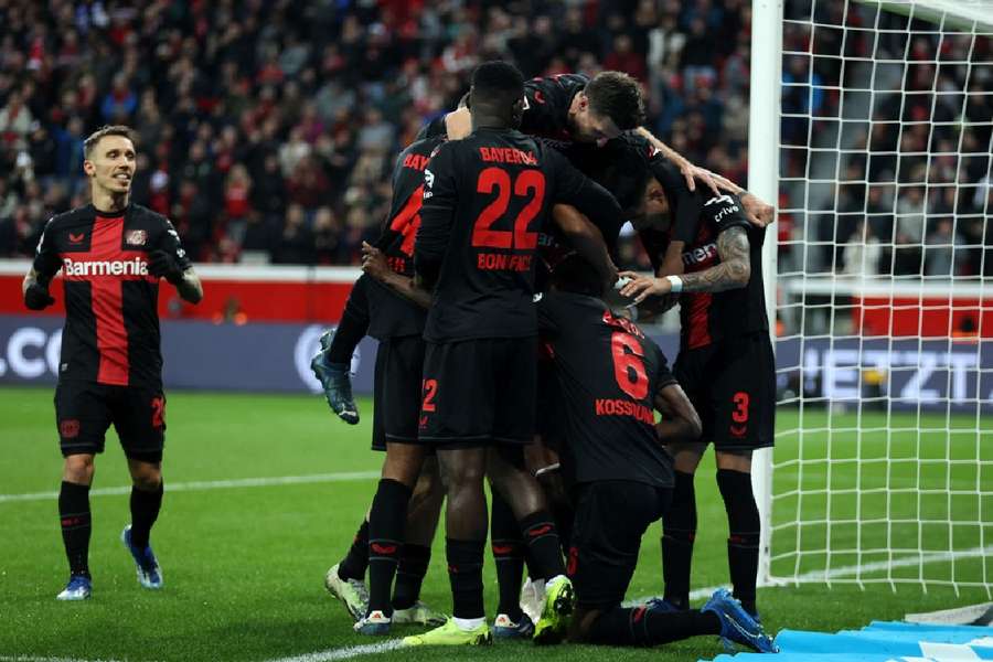 Leverkusen players celebrate goal 