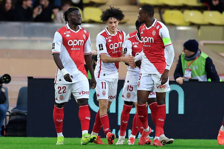 Monaco players celebrate their first goal