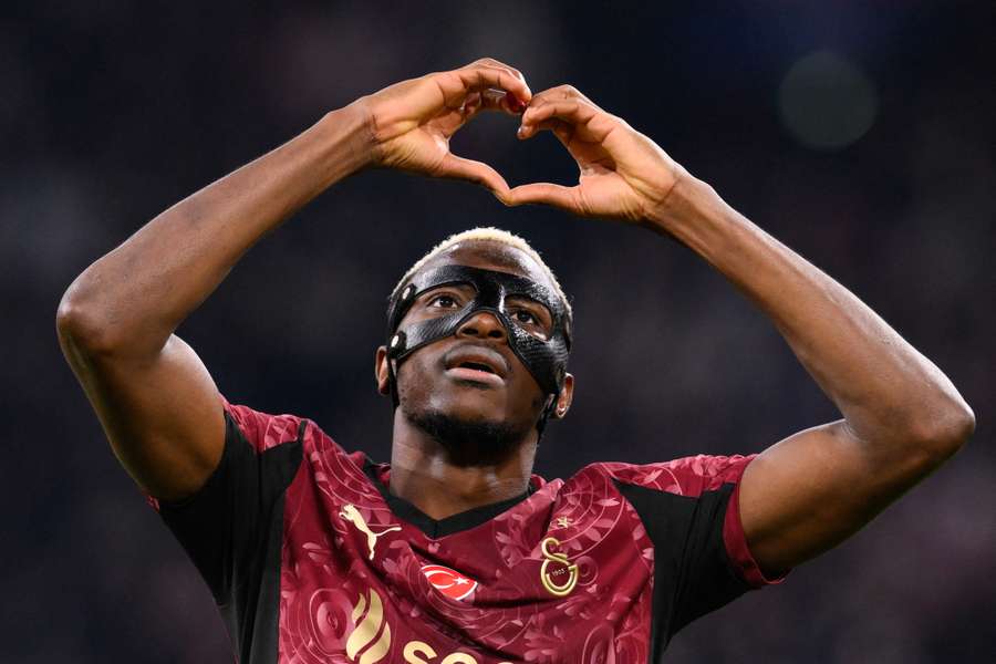 Victor Osimhen celebrates after scoring his third goal in the 78th minute