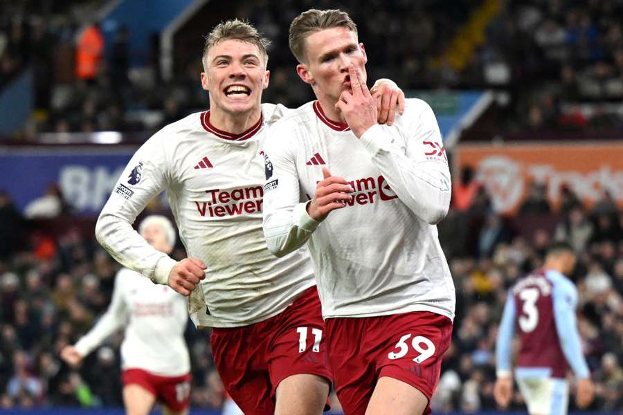 Scott McTominay of Manchester United (R) celebrates with teammate Rasmus Hojlund after scoring his team's second goal