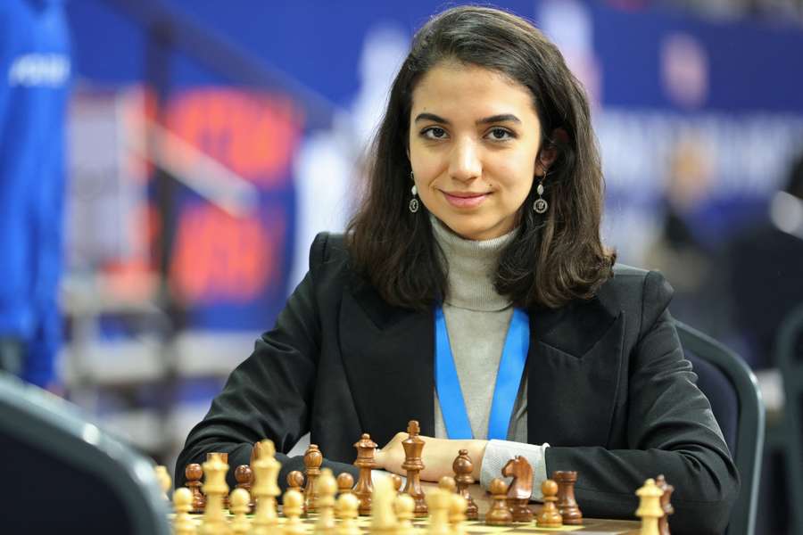 Sara Khadem of Iran sits in front of a chess board in Almaty, Kazakhstan on December 28th.