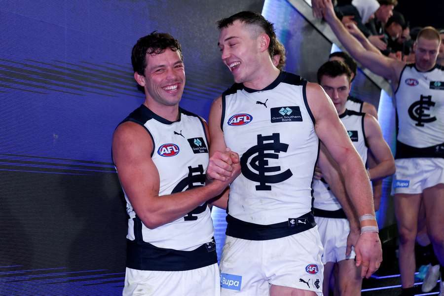Carlton's Oliver Florent and Patrick Cripps celebrate their weekend win over Richmond.