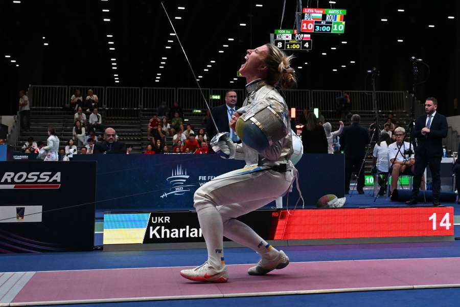 Olha Kharlan celebrates her win over Anna Smirnova before she was disqualified