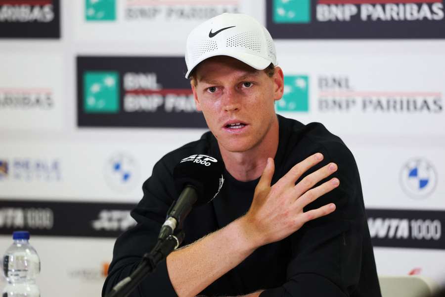 Jannik Sinner speaks during a press conference in Rome