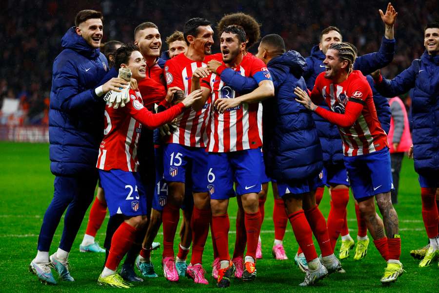 Atletico Madrid celebrate after winning the tie