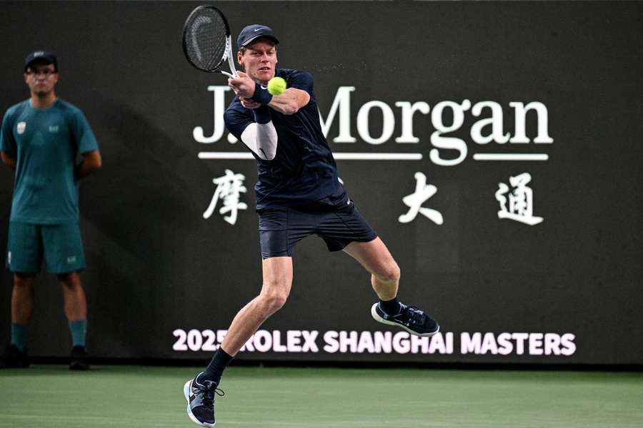Jannik Sinner hits a return during his Shanghai Masters match against Tallon Griekspoor