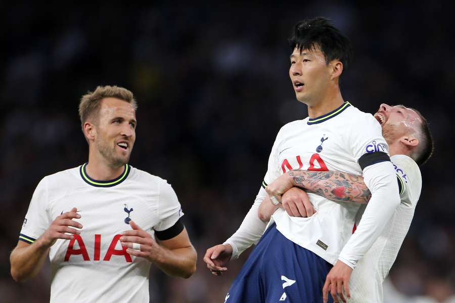 Danish midfielder Pierre-Emile Hojbjerg (R) picks up Tottenham Hotspur's South Korean striker Son Heung-Min