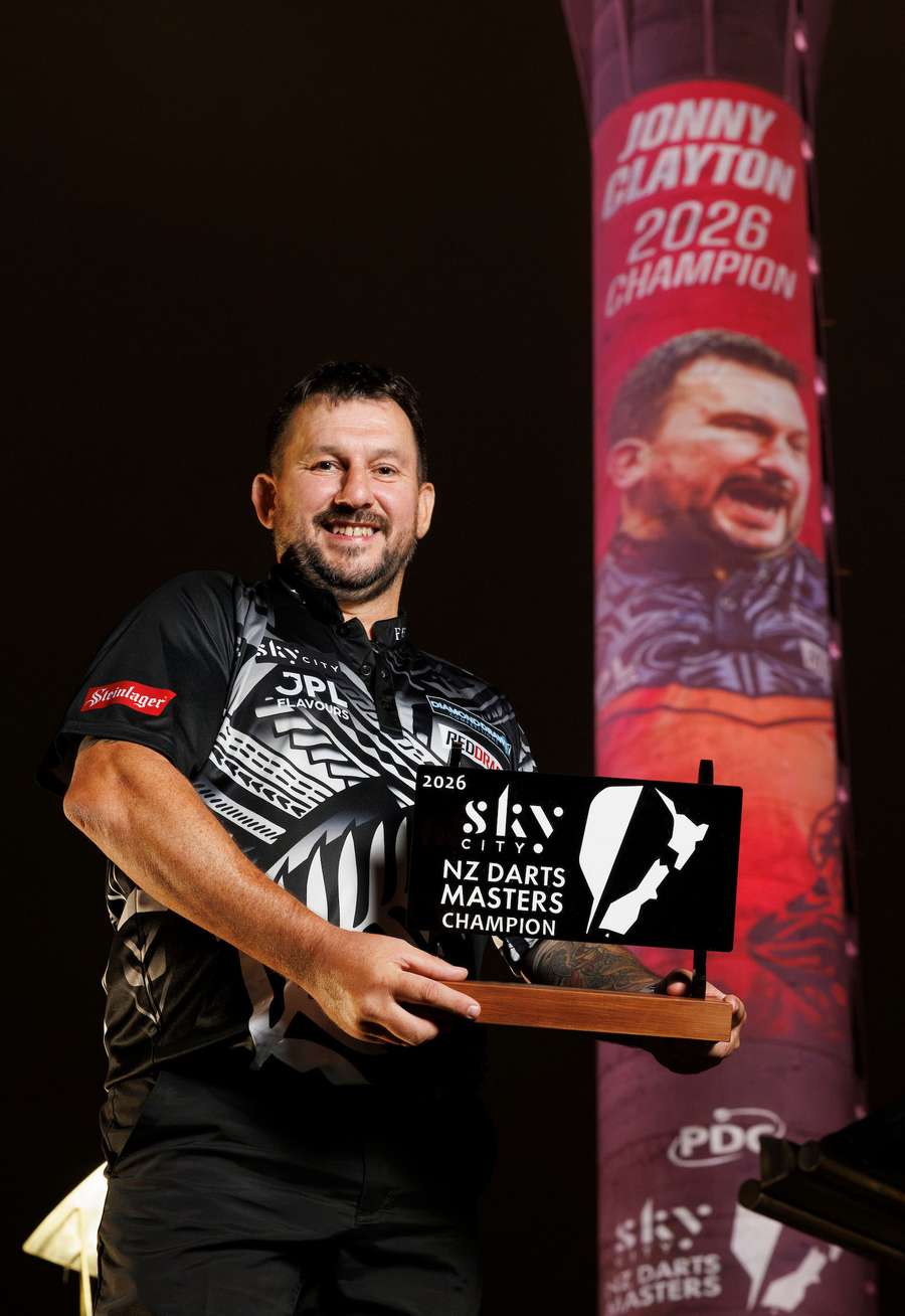 Clayton poses with the trophy Clayton poses with the trophy