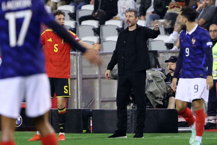 Belgium boss Van Bommel reacts on the touchline