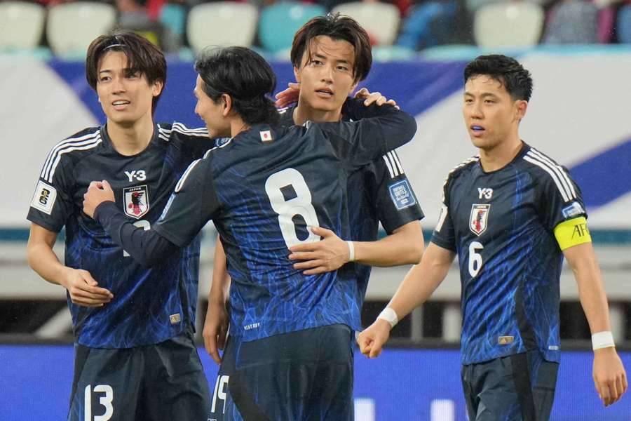 Koki OGAWA of Japan celebrates after scoring in the second half of 2026 FIFA World Cup Qualifier against China