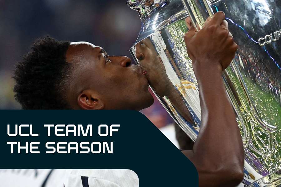 Vinicius Junior kisses the trophy as he celebrates after winning the UEFA Champions League