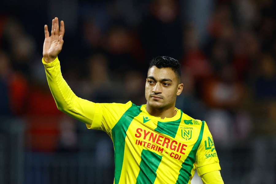 Mostafa Mohamed waves to Nantes supporters after the match