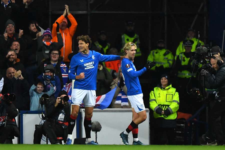Rangers' English midfielder #13 Todd Cantwell (R) celebrates scoring the team's second goal
