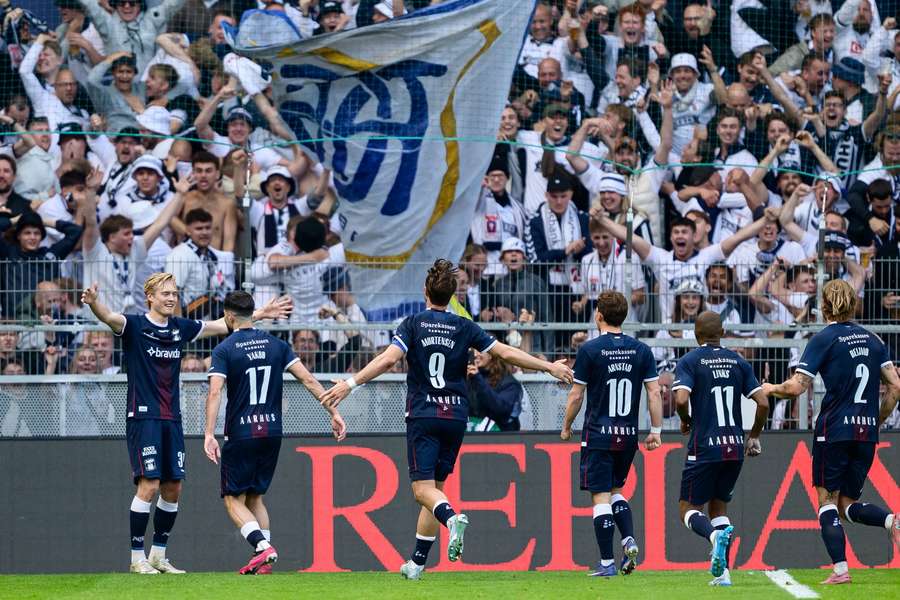AGF's players celebrate this 2-0 win against Brondby on Sunday