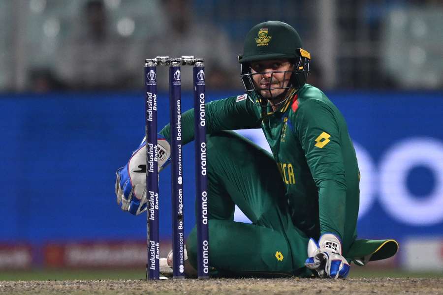 South Africa's wicketkeeper Quinton de Kock reacts during their World Cup defeat to Australia in 2023