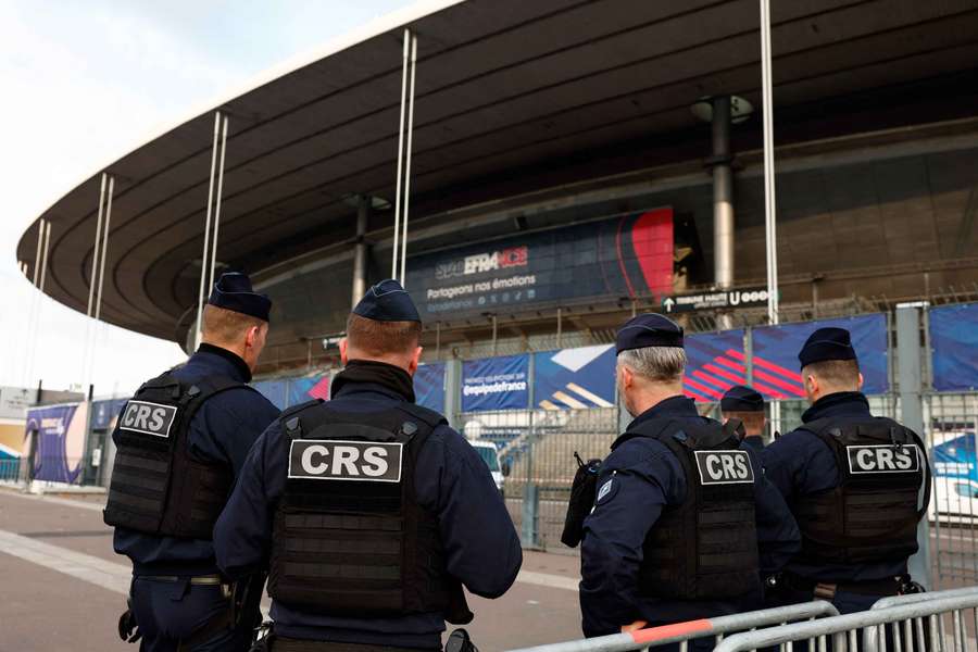 Police officers are seen outside the Stade de France as the city prepares to host Israel