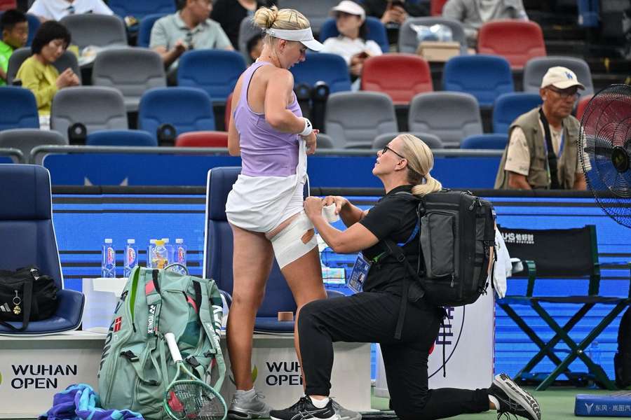 Clara Tauson receiving treatment in Wuhan 