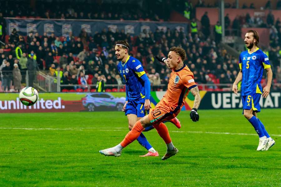 The Netherlands' Noa Lang shoots at goal against Bosnia