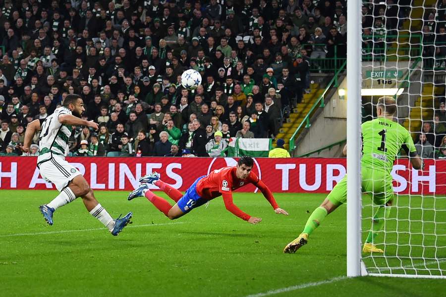 Alvaro Morata heads the ball and scores Atletico's equalising goal against Celtic