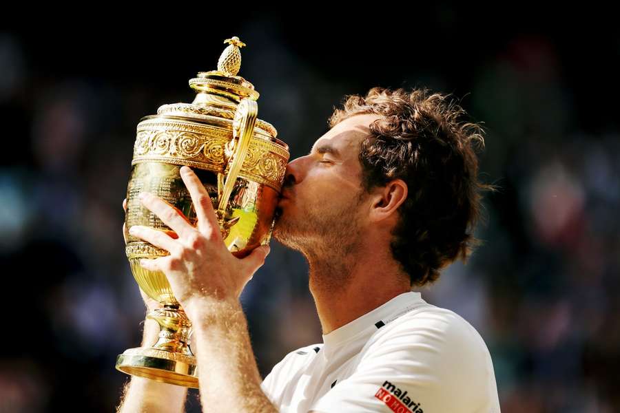 Murray celebrates with the Wimbledon trophy