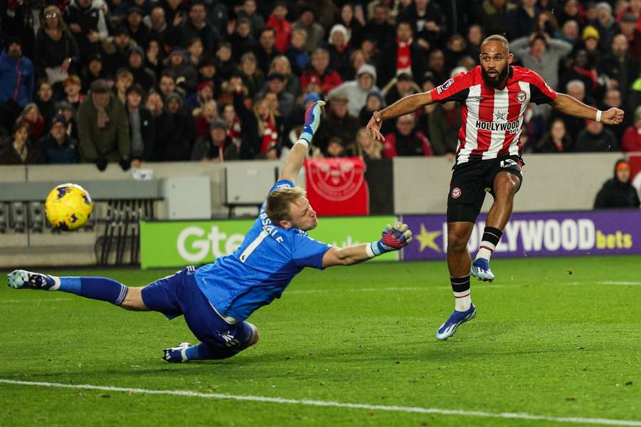 Brentford's Bryan Mbeumo has a shot at goal following an error by Arsenal goalkeeper Aaron Ramsdale