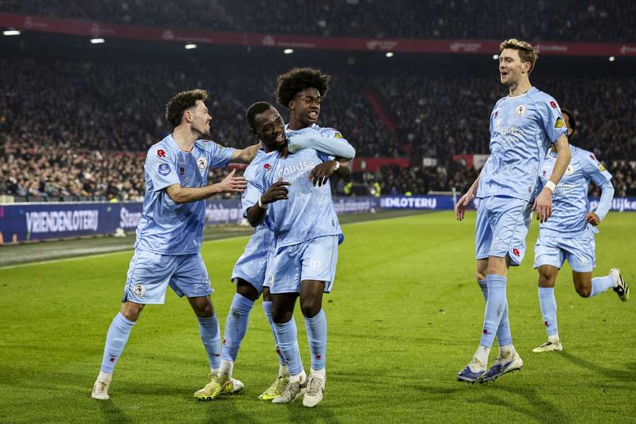 Sparta's Joshua Kitolano is swarmed by teammates after scoring against Feyenoord
