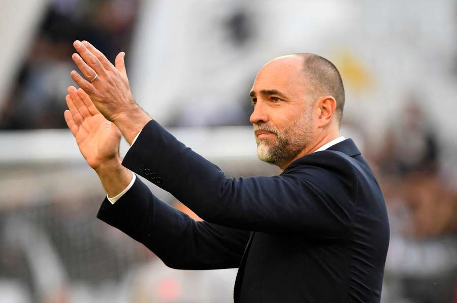 Juventus coach Igor Tudor applauds fans before a match